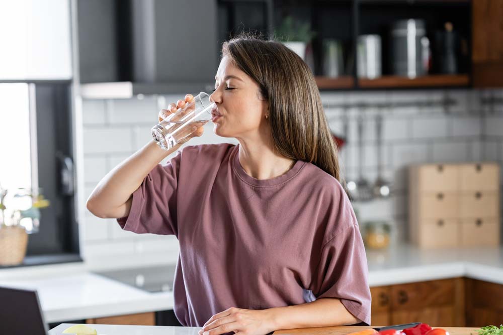 person drinking water